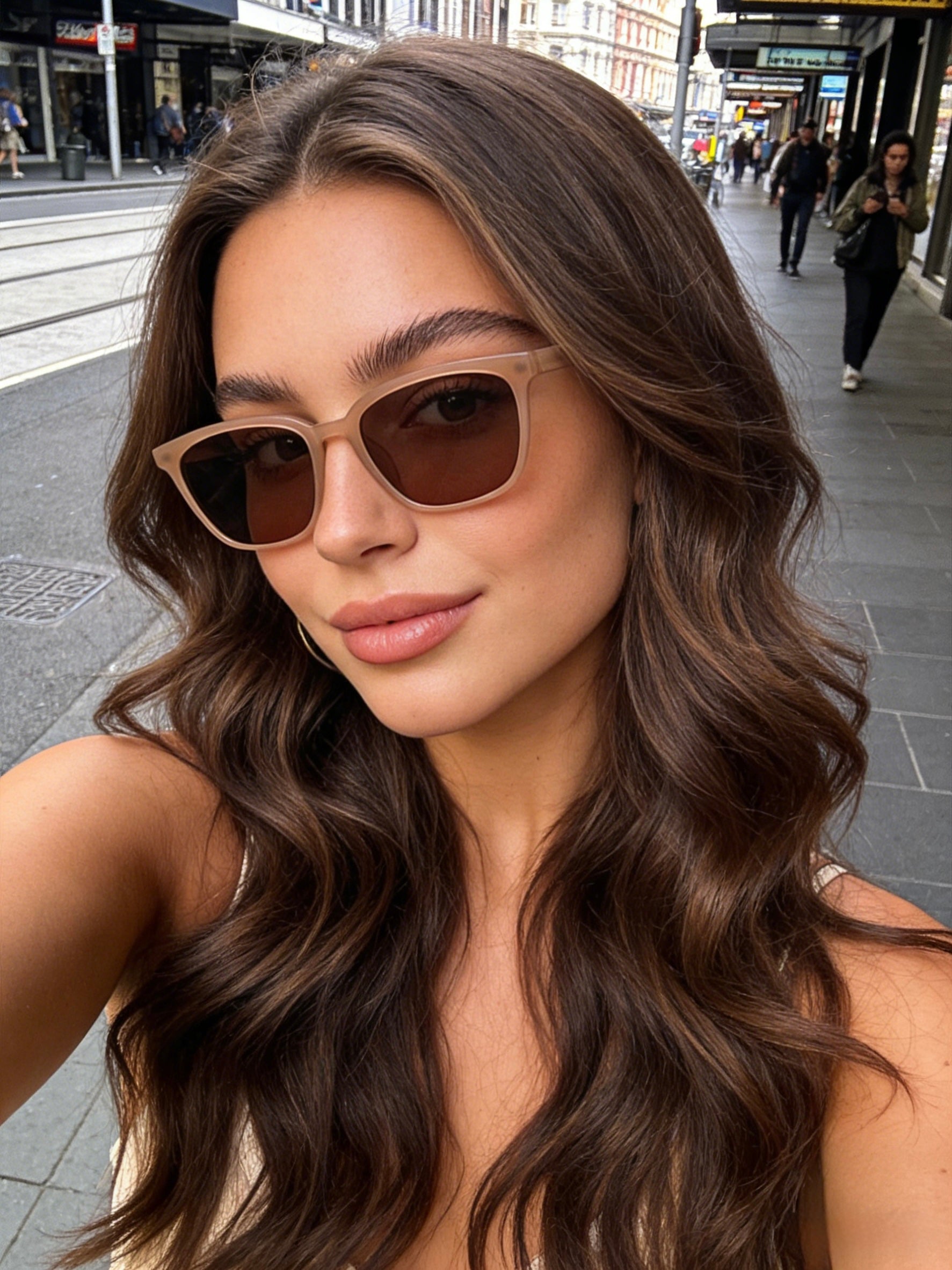 Beige polarized sunglasses for women with UV protection, classic square frames in neutral tones.