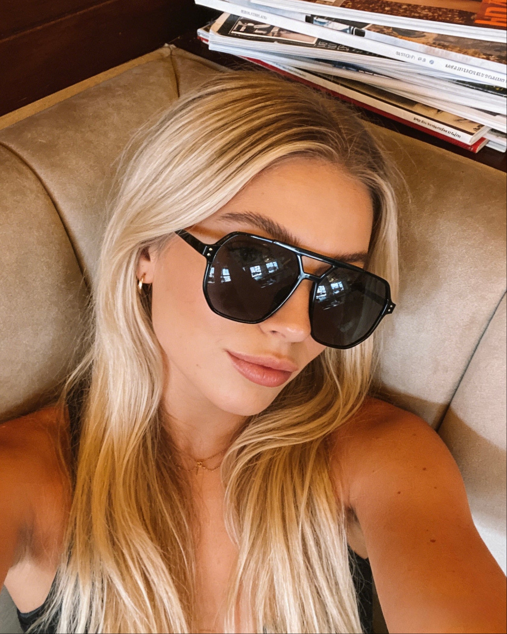 Oversized black aviator sunglasses with a flat top bridge, polarized lenses, and UV protection, unisex retro square eyewear.