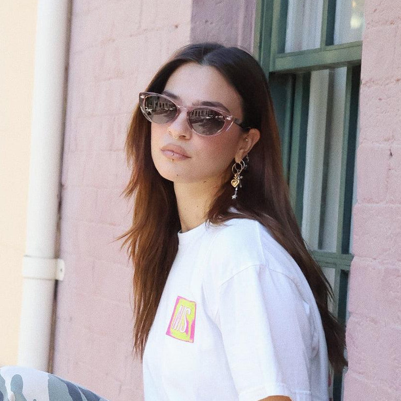 Vintage-inspired pink cat-eye sunglasses with polarized TAC lenses and UV protection for women, stylish eyewear for sun safety.