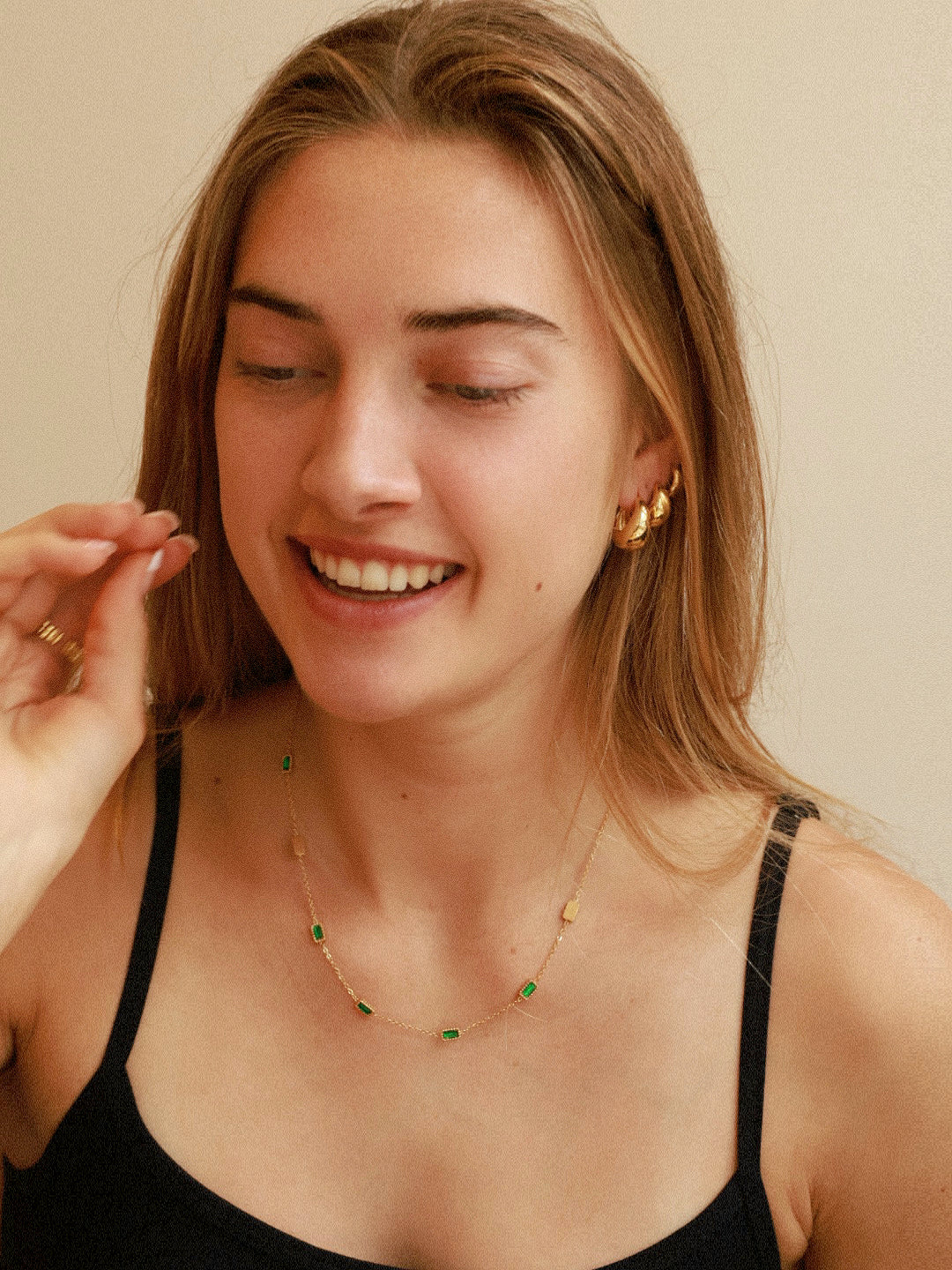 18K gold plated stainless steel necklace with five rectangular emerald green zircon station pendants