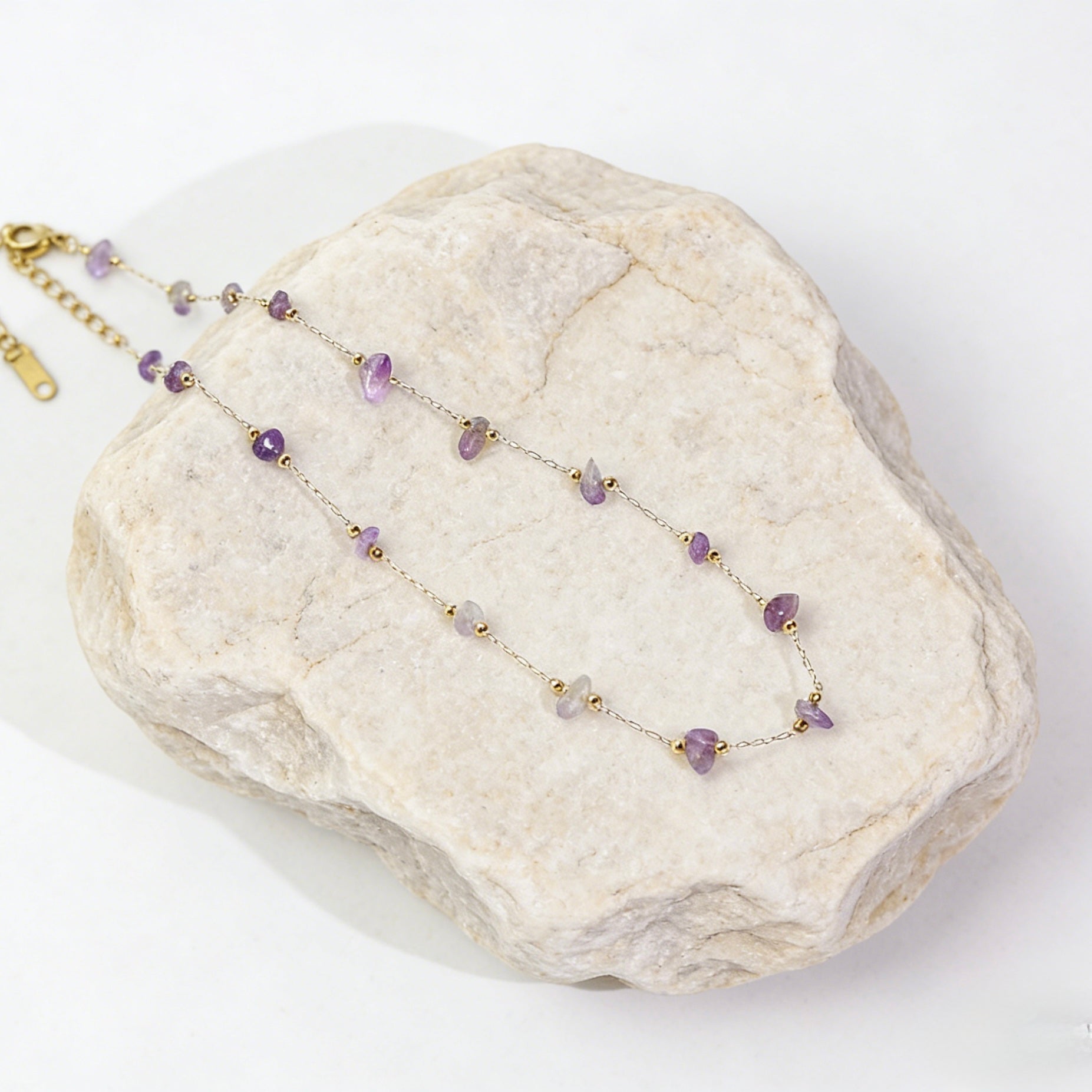 Bohemian style 18K gold plated necklace with delicate natural amethyst chips and raw purple gemstone fragments for layering
