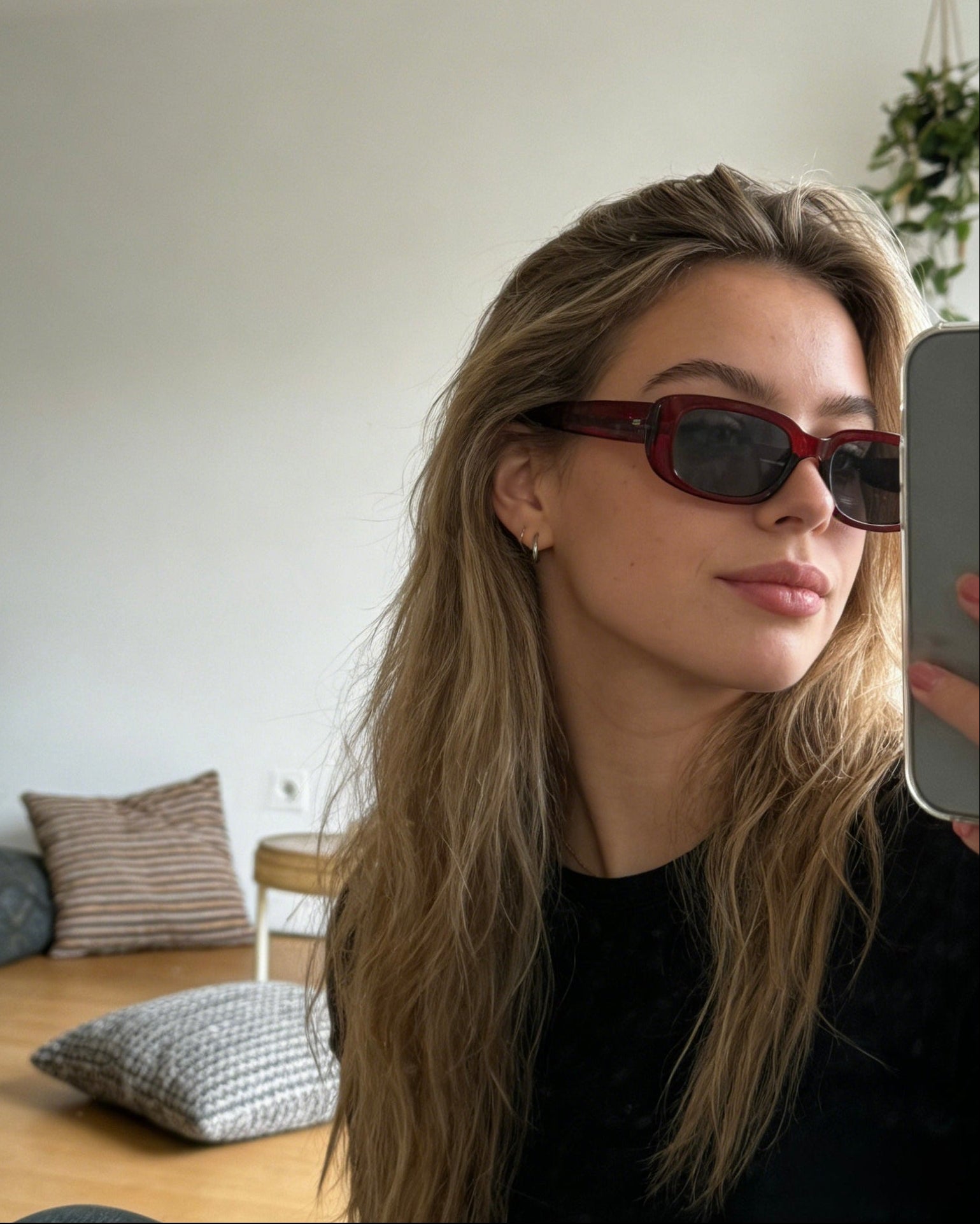 Red polarized rectangle sunglasses for women, UV400 protective lenses, chic summer eyewear accessory.

