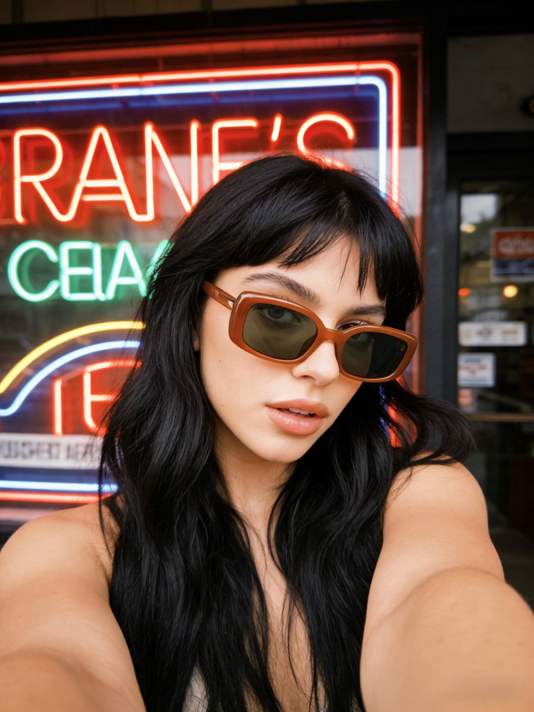 Amber tortoise shell rectangle sunglasses, 90s retro style featuring polarized lenses and UV400 protection, chic everyday fashion accessory.