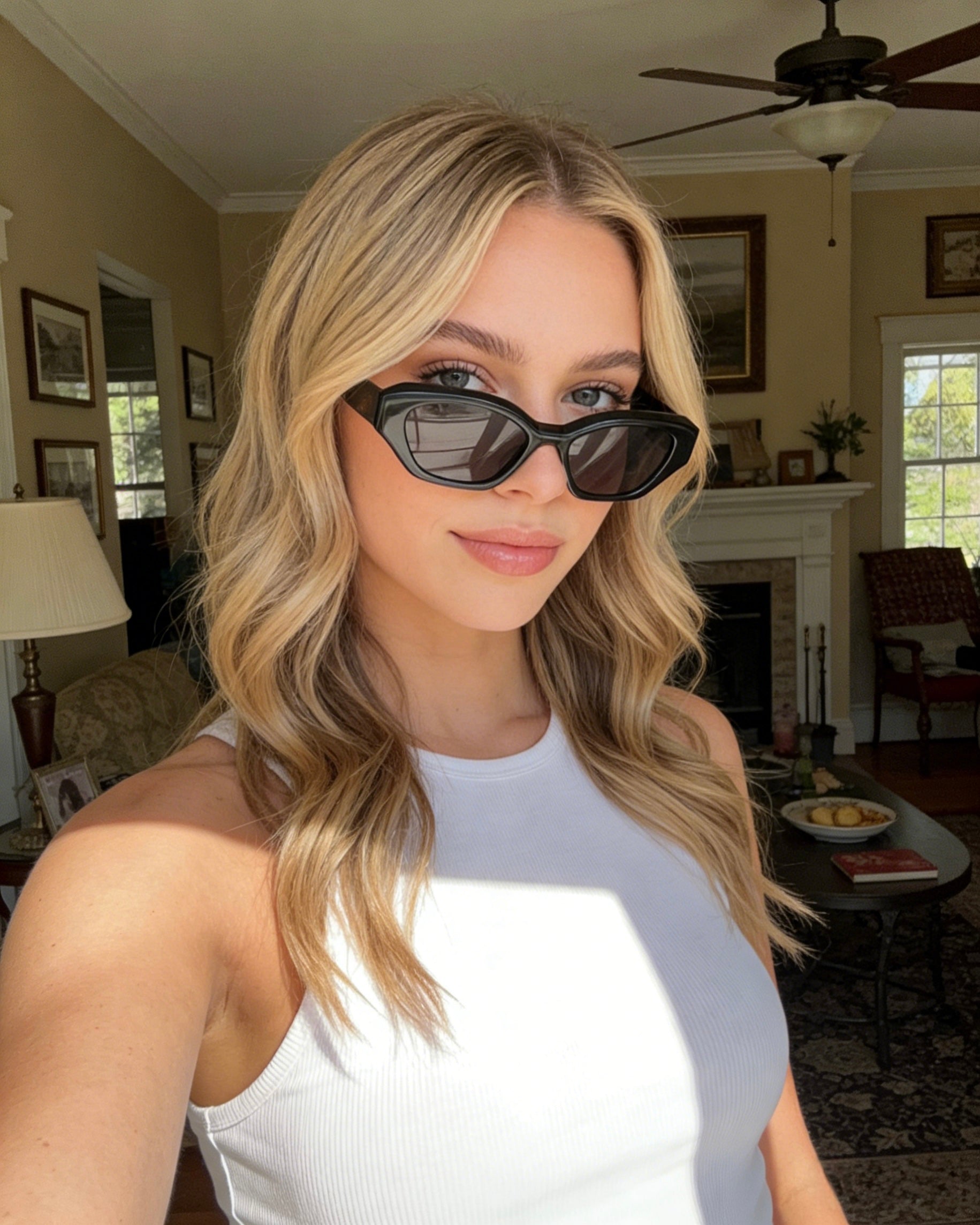 Stylish unisex polarized cat-eye sunglasses by By Charley, featuring a classic black frame that offers 100% UV protection and glare reduction for a bold, vintage-inspired aesthetic.