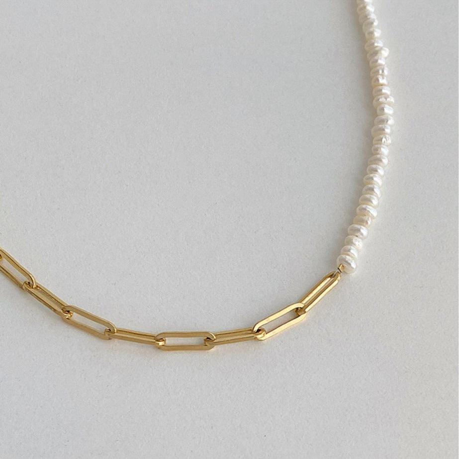 Detail view of Hazel choker's 18K gold plated oval links, highlighting the clean, modern metalwork.