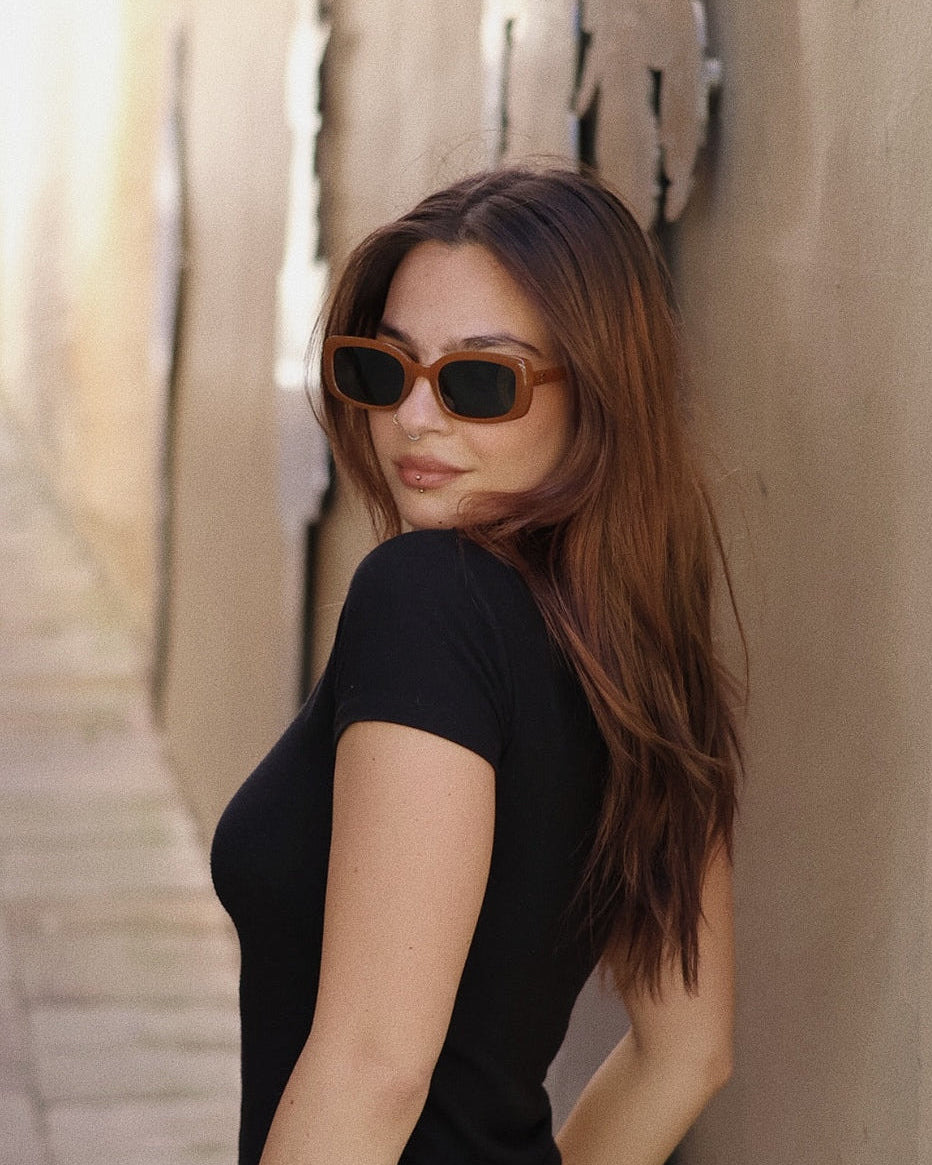Amber tortoise shell rectangle sunglasses, 90s retro style featuring polarized lenses and UV400 protection, chic everyday fashion accessory.