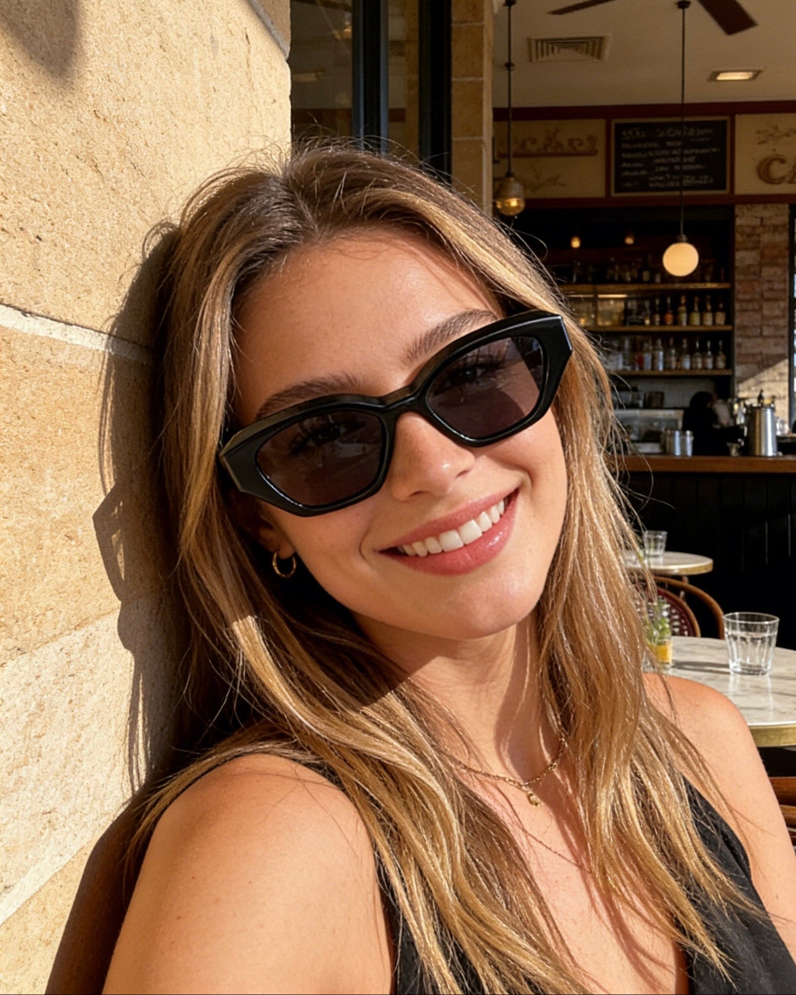 Stylish unisex polarized cat-eye sunglasses by By Charley, featuring a classic black frame that offers 100% UV protection and glare reduction for a bold, vintage-inspired aesthetic.
