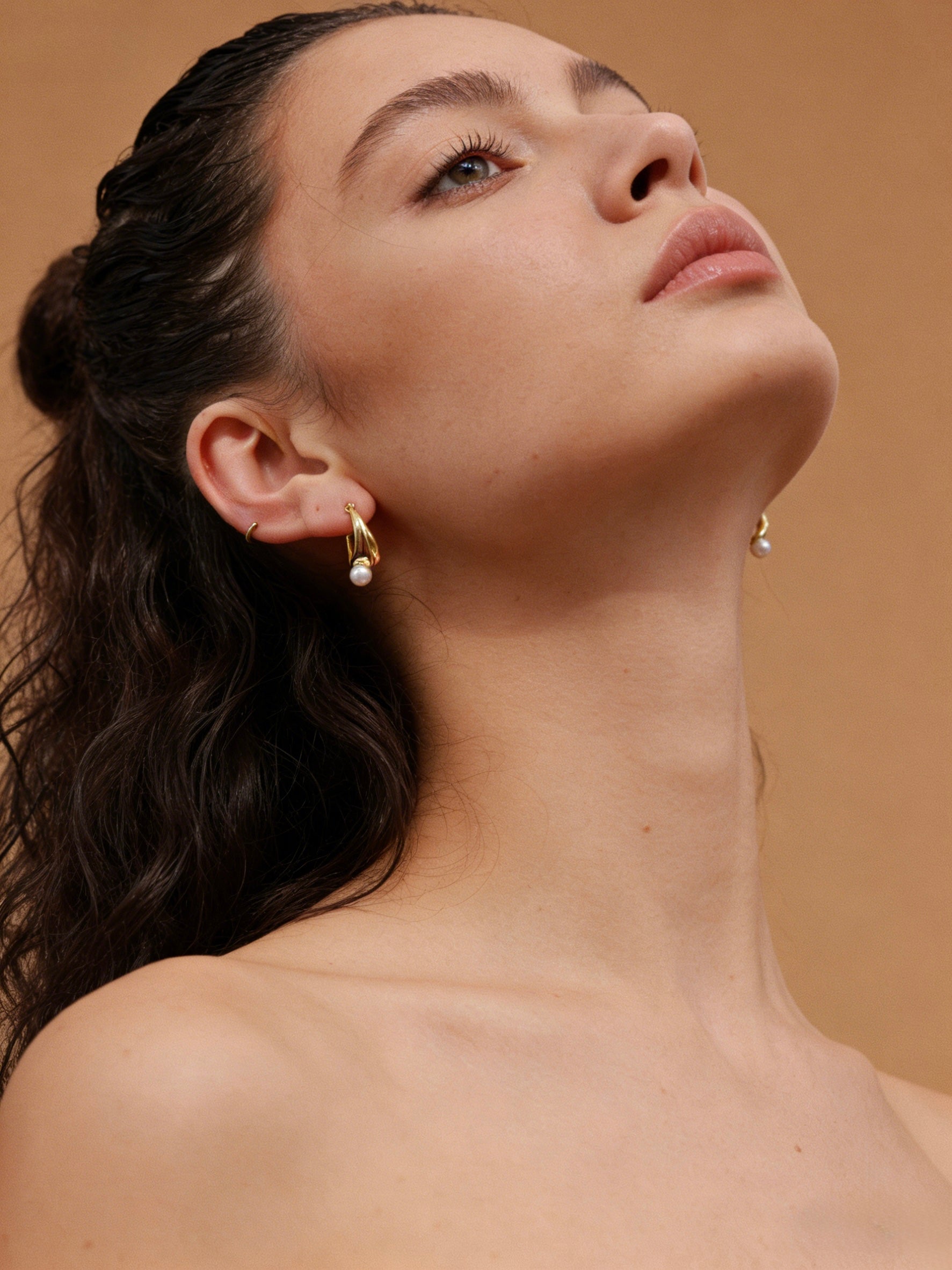 Modern 18K gold plated ribbon twist earrings with S925 sterling silver posts and a natural freshwater pearl drop