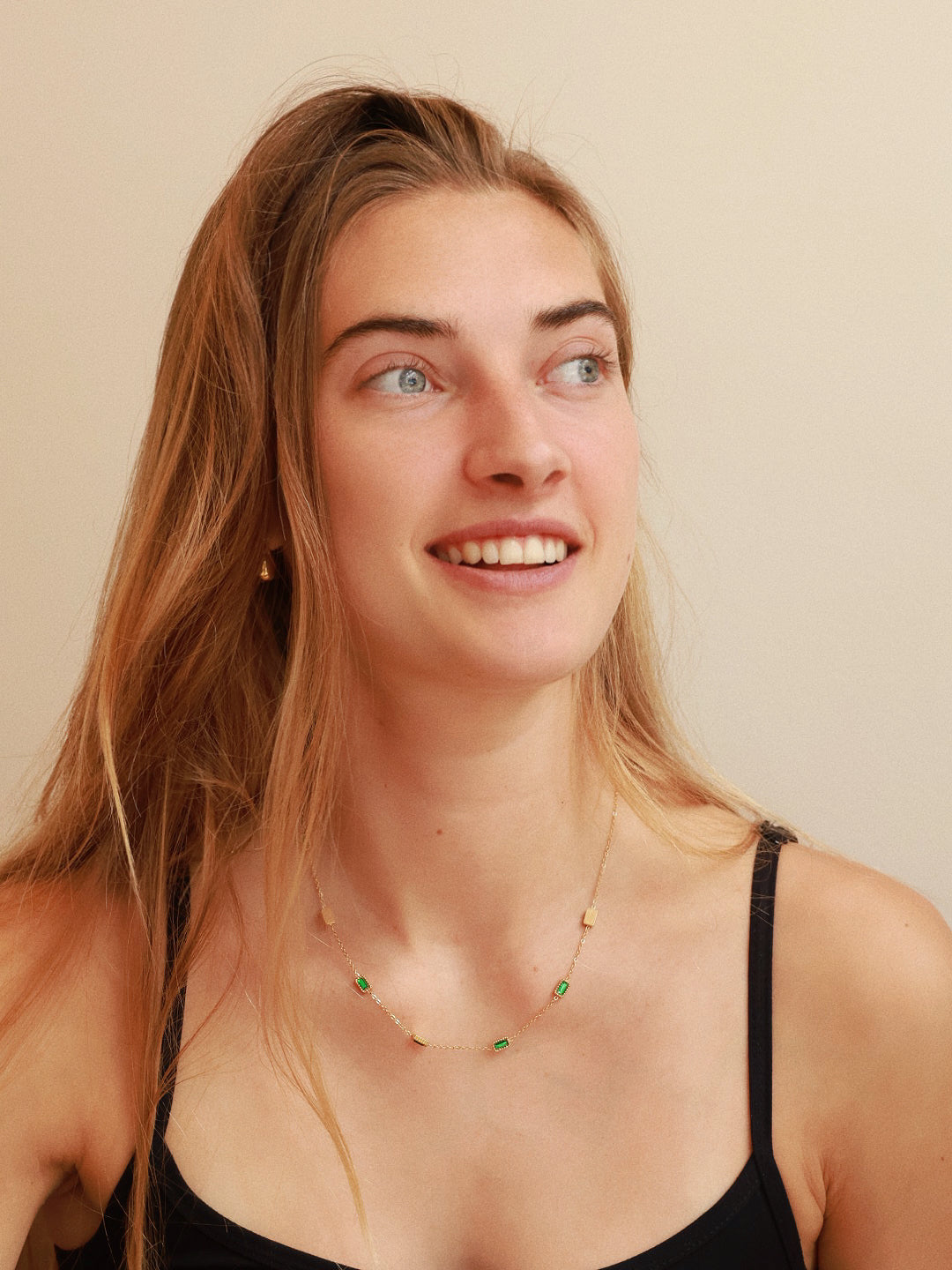 18K gold plated stainless steel necklace with five rectangular emerald green zircon station pendants