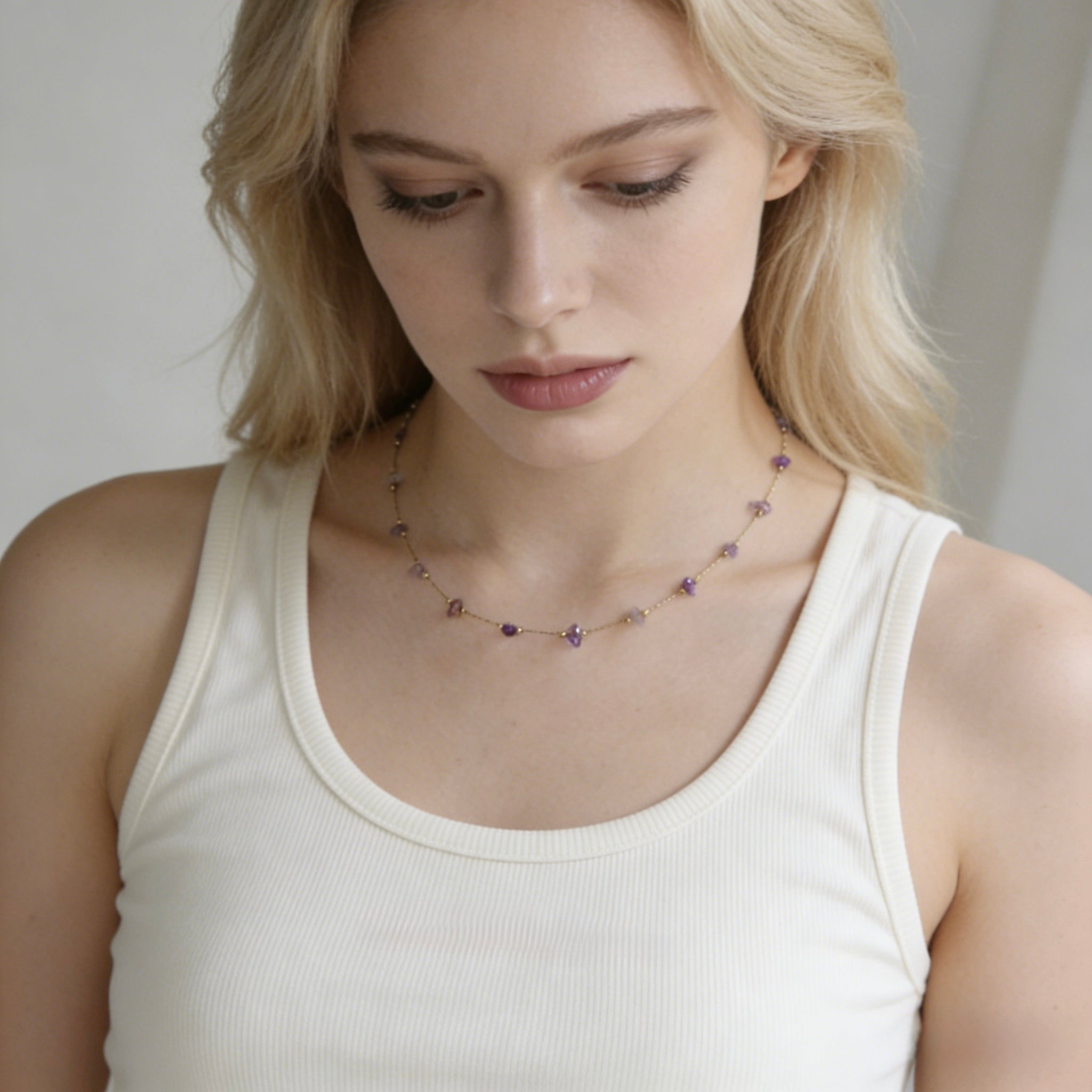Bohemian style 18K gold plated necklace with delicate natural amethyst chips and raw purple gemstone fragments for layering