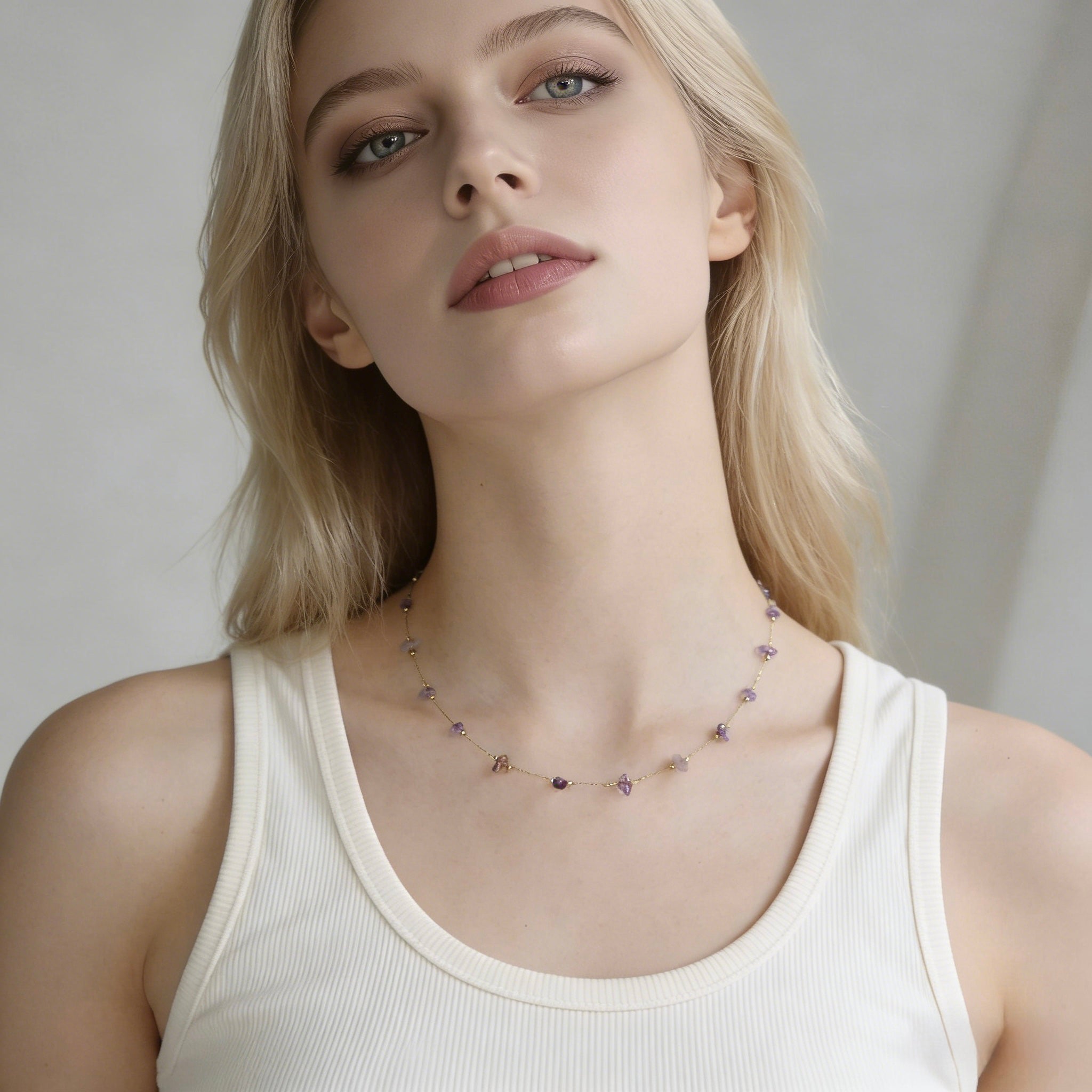 Bohemian style 18K gold plated necklace with delicate natural amethyst chips and raw purple gemstone fragments for layering