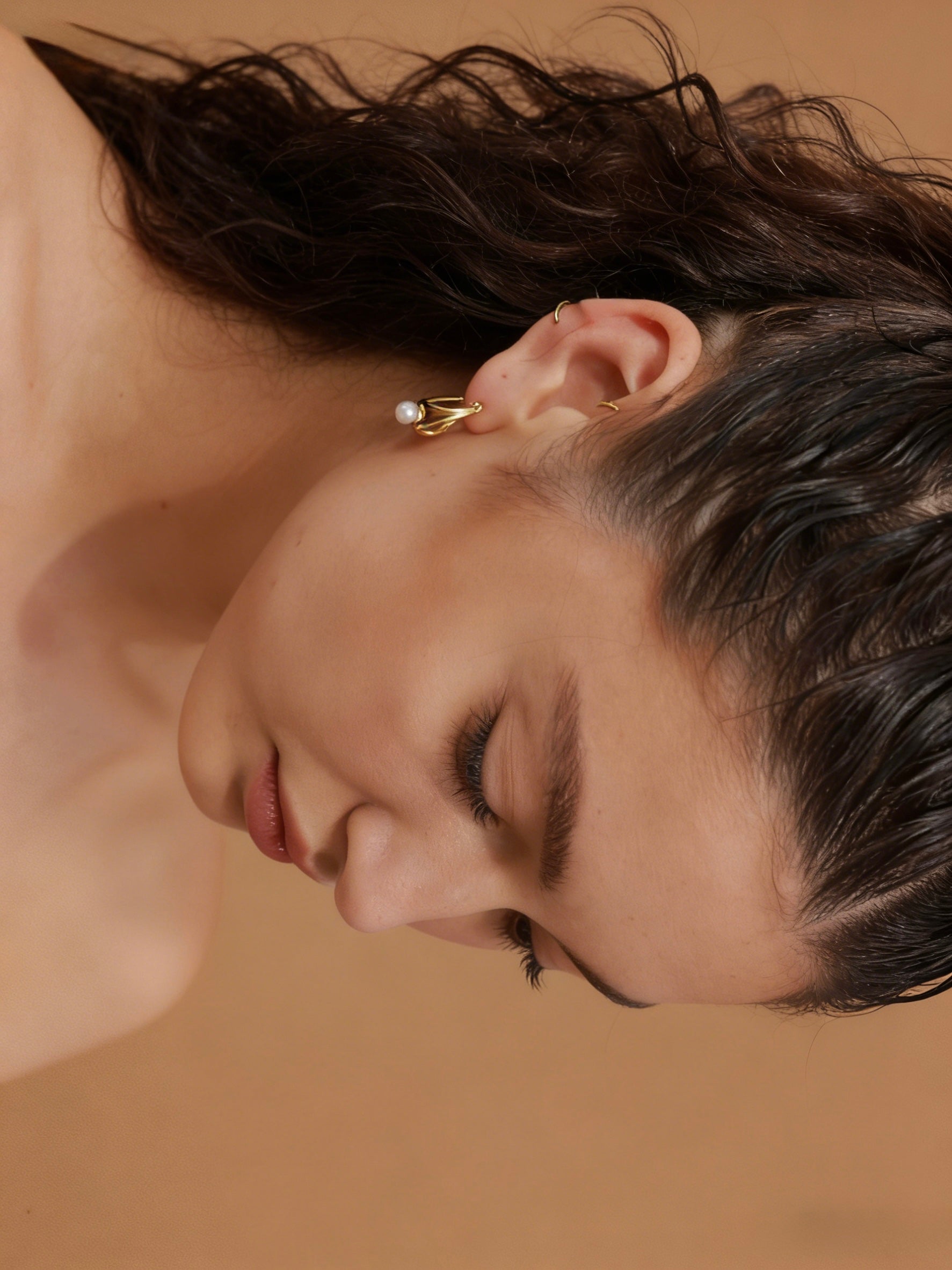 Modern 18K gold plated ribbon twist earrings with S925 sterling silver posts and a natural freshwater pearl drop