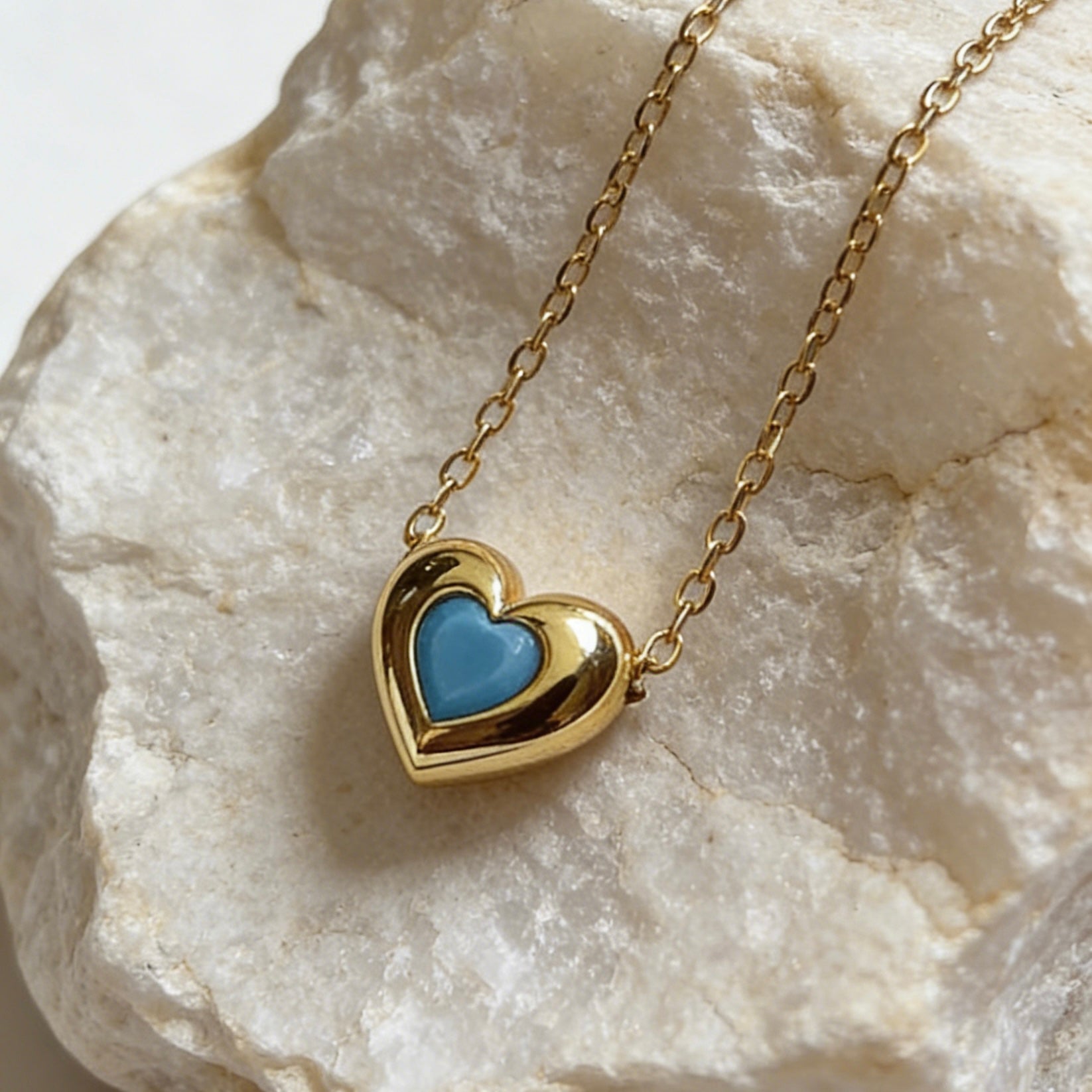 18K gold plated over sterling silver heart-in-heart green zircon necklace featuring a central black heart-shaped zircon on a dainty gold chain