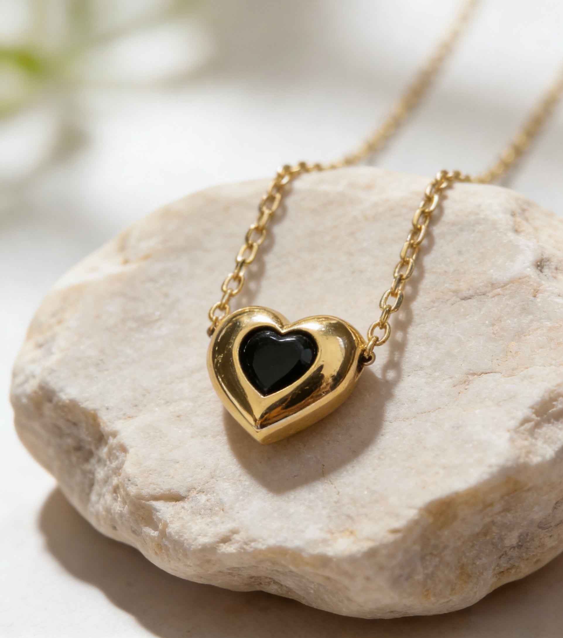 18K gold plated over sterling silver heart-in-heart green zircon necklace featuring a central black heart-shaped zircon on a dainty gold chain
