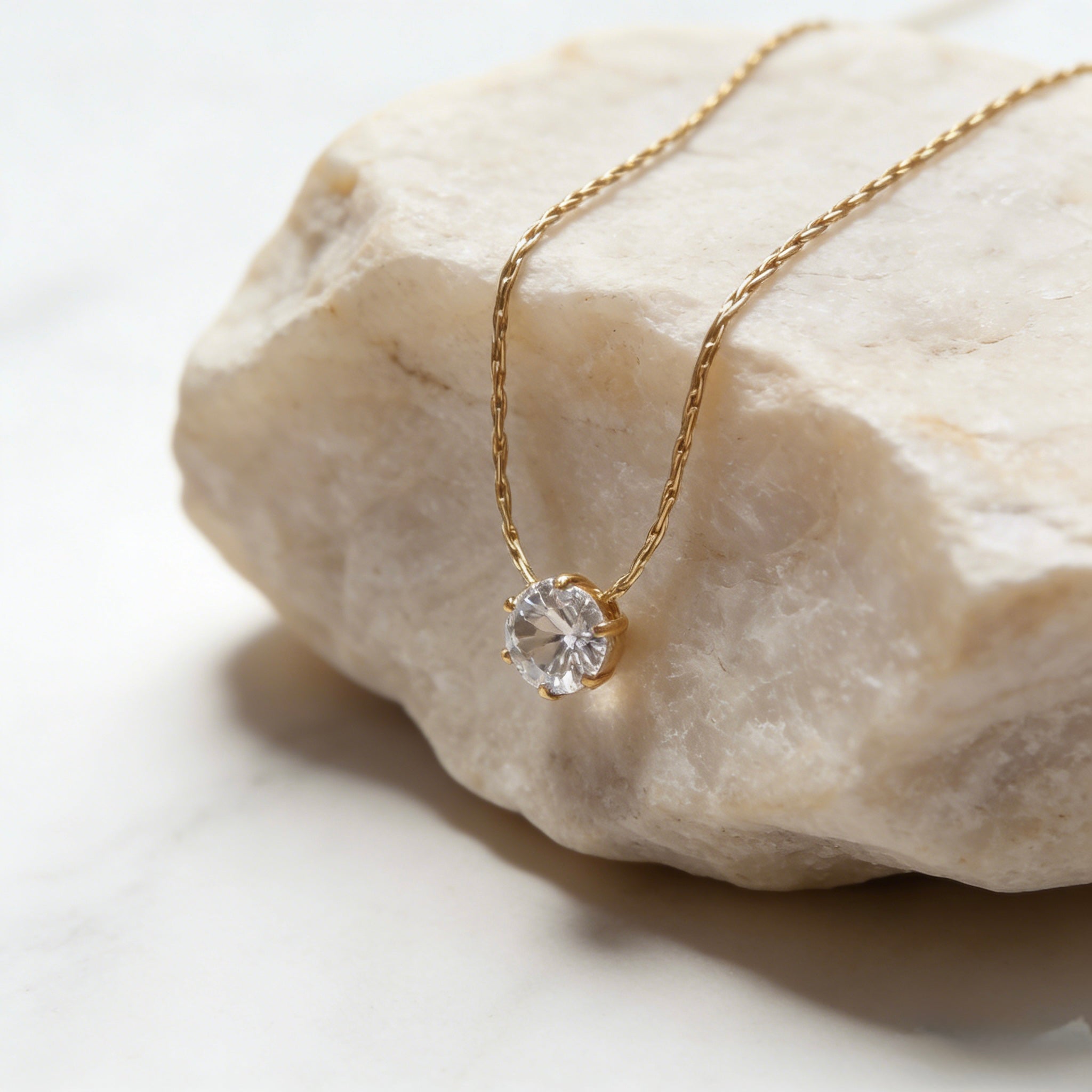 18K gold plated stainless steel necklace with a single round sparkling zircon solitaire pendant. Dainty Solitaire Diamond Necklace, 18K Gold Plated Stainless Steel, Waterproof Sparkly Round Zircon Pendant, Tarnish Free Everyday Jewelry